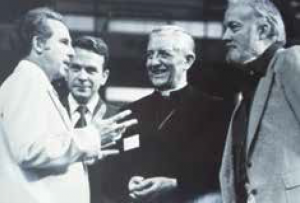 Charles Simpson speaking with Cardinal Seunens and Don Basham